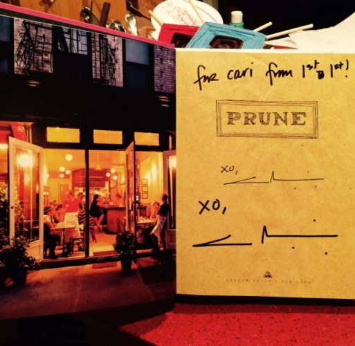 Signed copy of "Prune," with Eric Wolfinger's photo of the space. Photo by Cari Borja