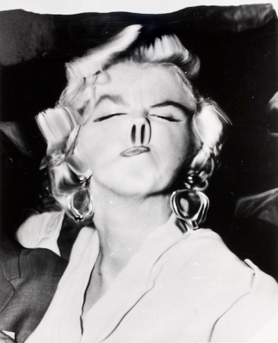 Hollywood glamour distorted: A 1950s photo of Marilyn Monroe by Weegee (Arthur Fellig).